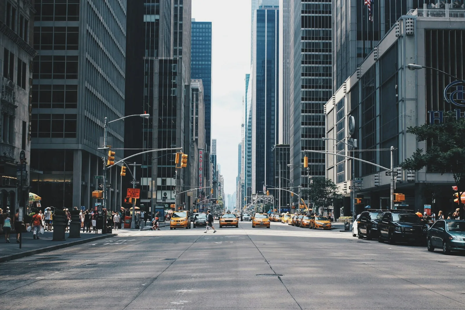 Midtown Manhattan avenue lined with office towers
